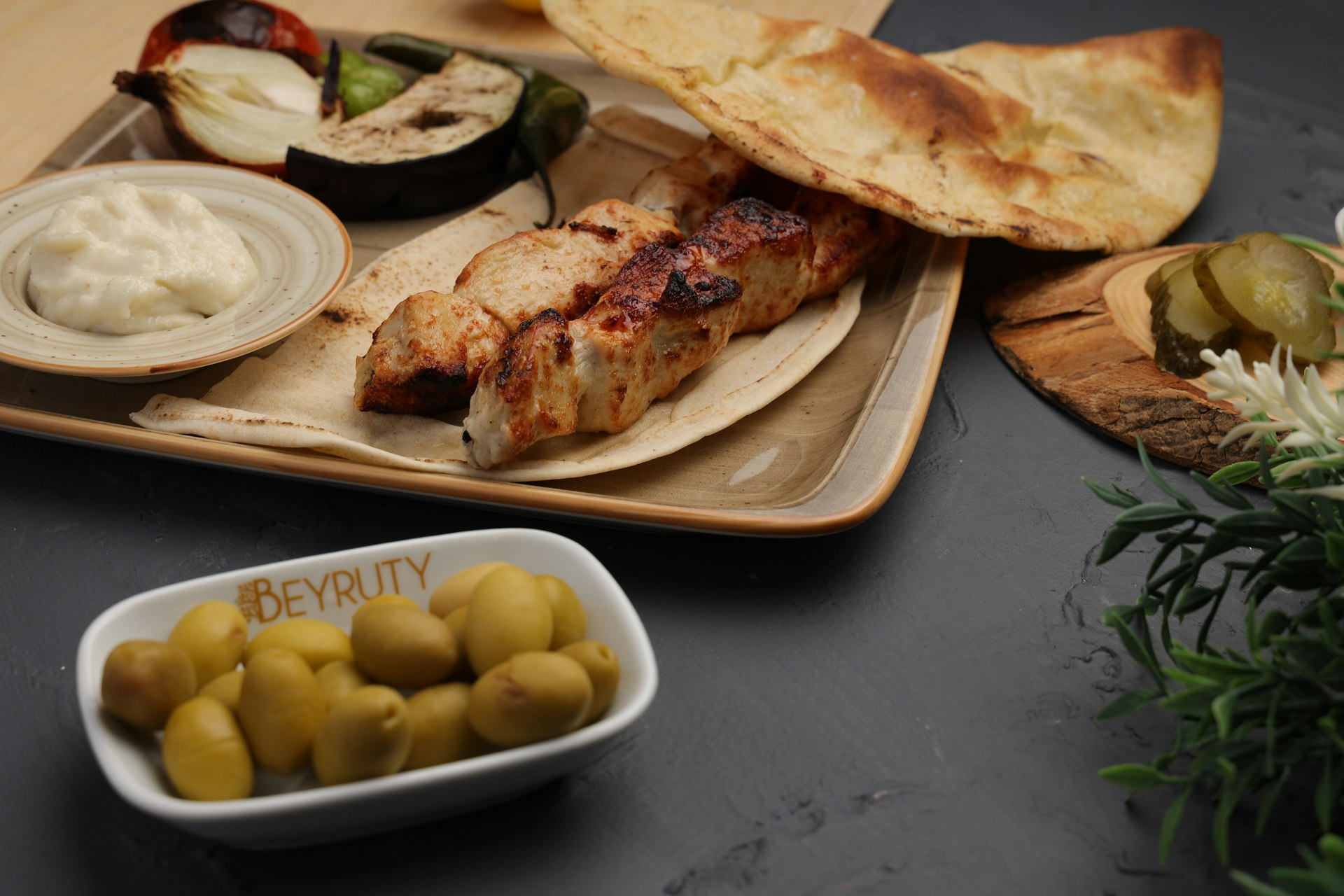 Charcoal-grilled Egyptian chicken with charred lemon and herbs